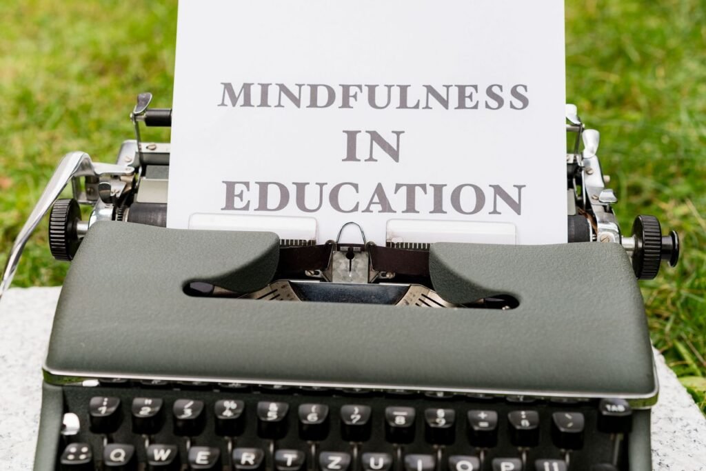 pexels photo 18485538 A vintage typewriter showcasing 'Mindfulness in Education' concept outdoors.